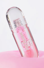 The Cosmetic Pouch & Lip Oil